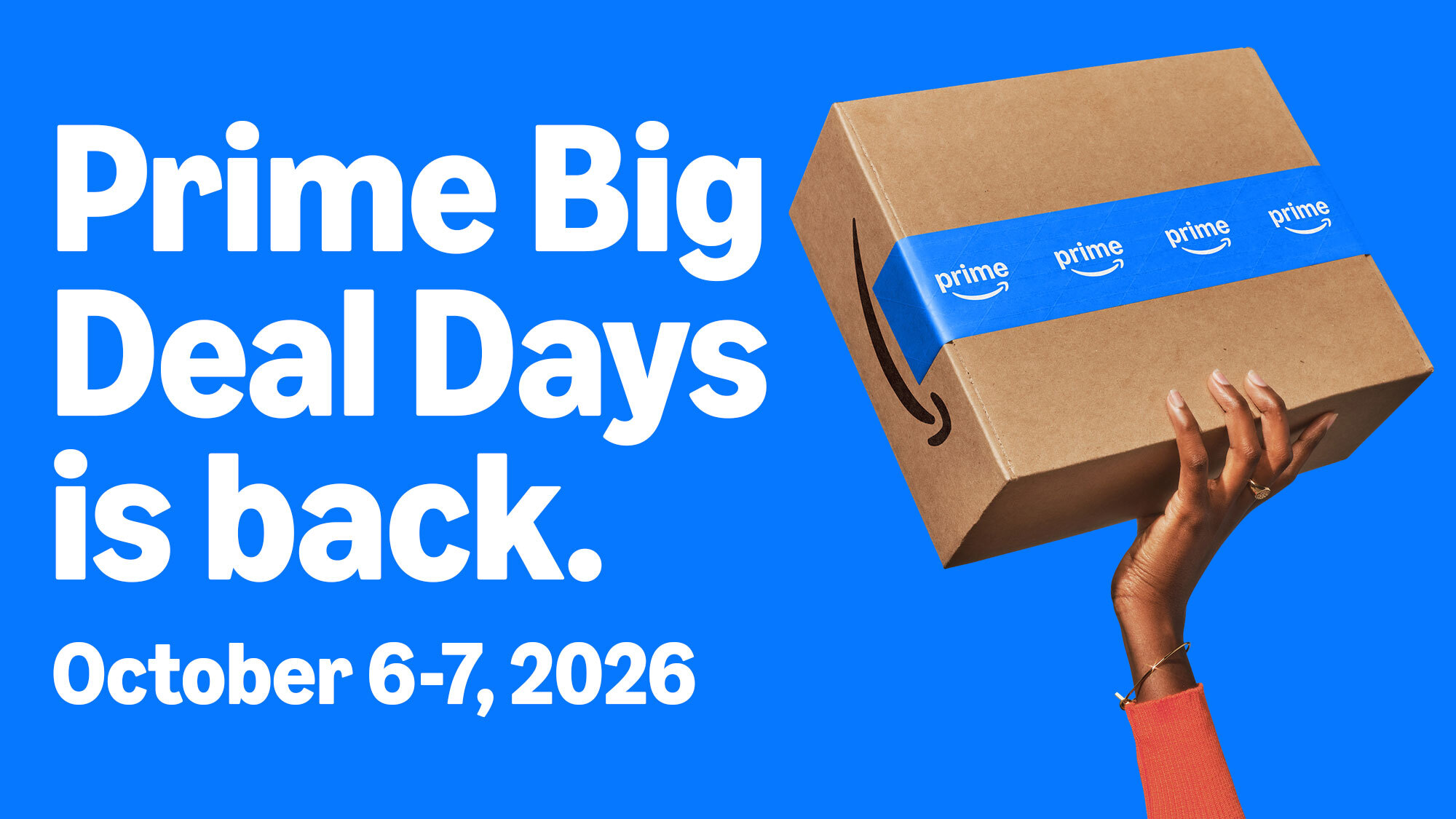 Hand holding a box with Prime tape, announcing Prime Big Deal Days October 6-7, 2026